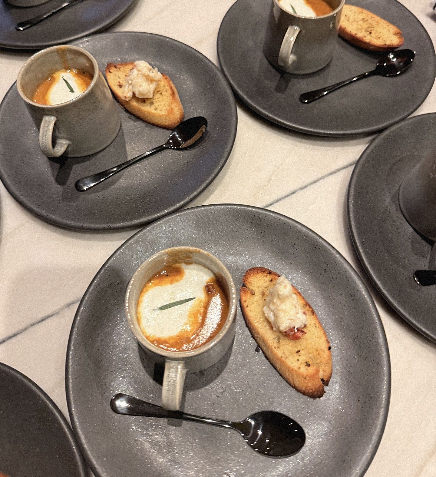 Lobster bisque plated for the whole table