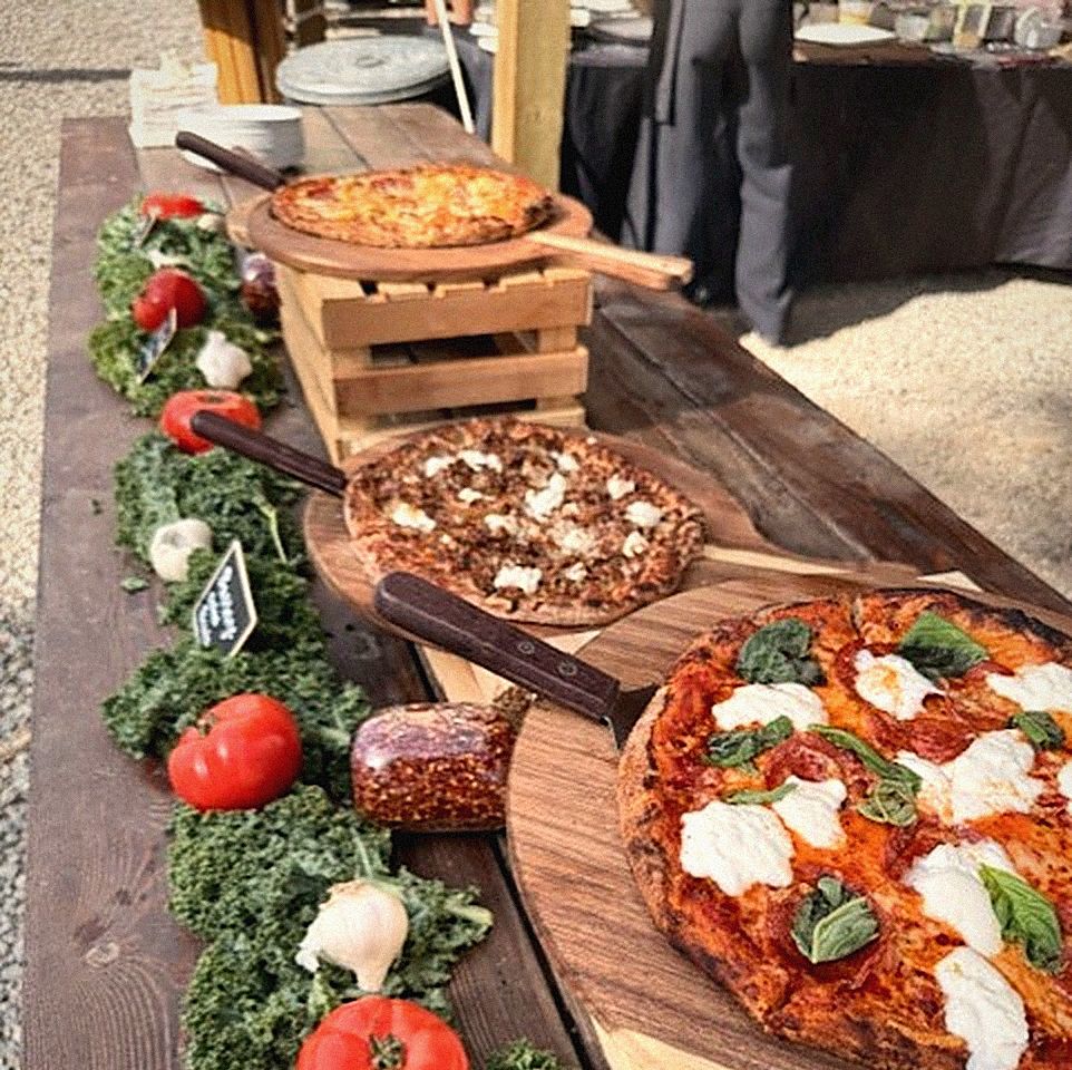 Pizza station set up for an outdoor event